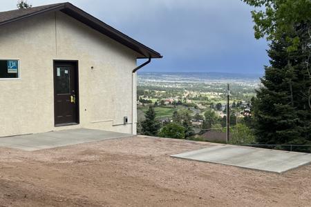 Concrete hot tub pad in Palmer Lake, Colorado. Installed a concrete entry way into the home as well as a concrete pad for a hot tub.