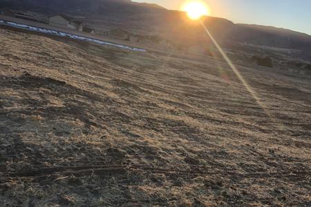 Seed and straw crimp in Monument, Colorado… end of the day, beautiful sunset