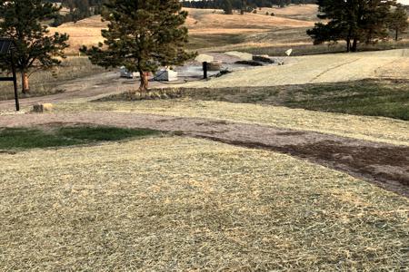Erosion Control blanket installed in Black Forest, Colorado to stop the erosion and to help get the grass seed to germinate