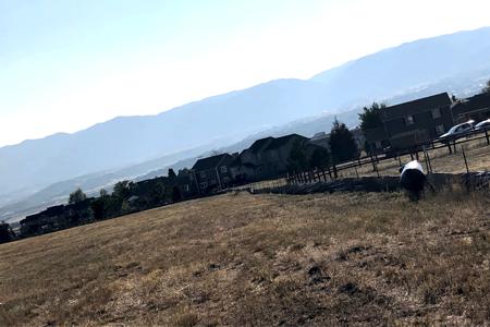 Silt fence install in Monument, Colorado so that the dirt on the construction site does not leave the site and protects the adjoining property owners.