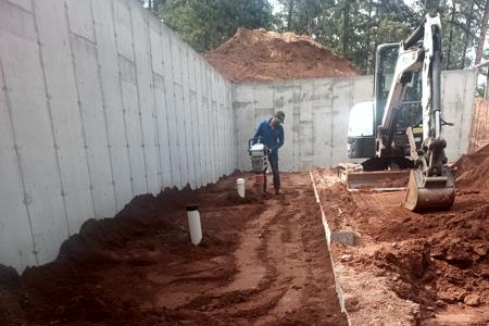 Excavating in Larkspur, Colorado. Backfilling the walkway that will be behind the detached garage for hidden storage. Making sure we get everything compacted.