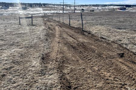 Excavating in Black Forest, Colorado for the trenching and installation of new Fiber optic lines