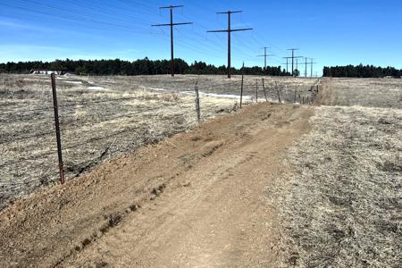 Excavating in Black Forest, Colorado for the trenching and installation of new Fiber optic lines
