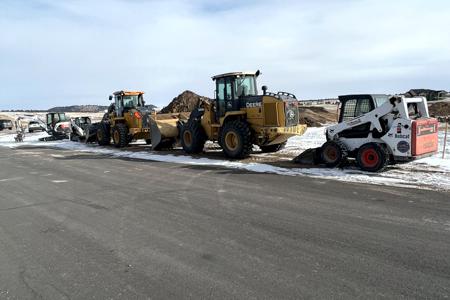 Excavating Black Forest, Colorado as we are lined up to start the day off excavating