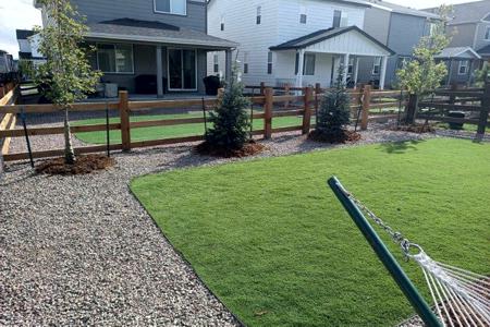 Landscaping Monument, Colorado. Installed synthetic turf and landscaping in the back yard of a home in Monument, Colorado for the dogs and kids.