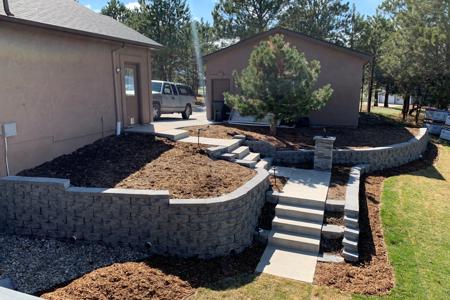 Retaining wall in Monument, Colorado to allow for more usable space as well as for erosion control.