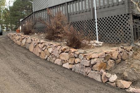 Boulder retaining wall in Monument, Colorado